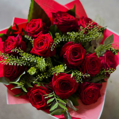 Classic Red Rose Bouquet - Rich red roses beautifully arranged with fresh foliage for a romantic and elegant gift.